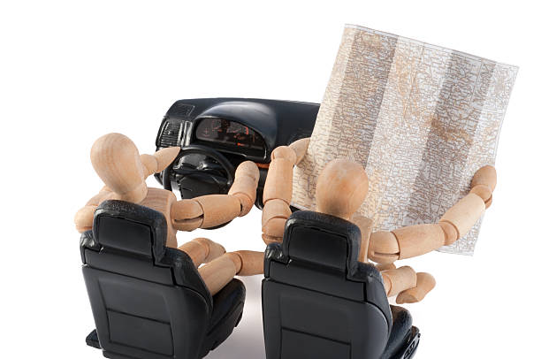 Wooden Mannequin On Holiday Travel. Who Knows The Right Way? Bon Voyage :)